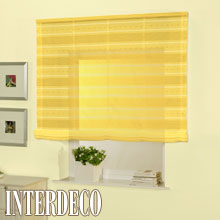 Mit gelben Gardinen die Fenster verschönern.