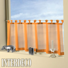 Orange Gardinen als moderne Gardinendekoration.