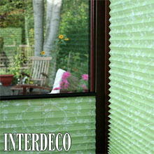 Grünes Plissee für einen frischen Sichtschutz.